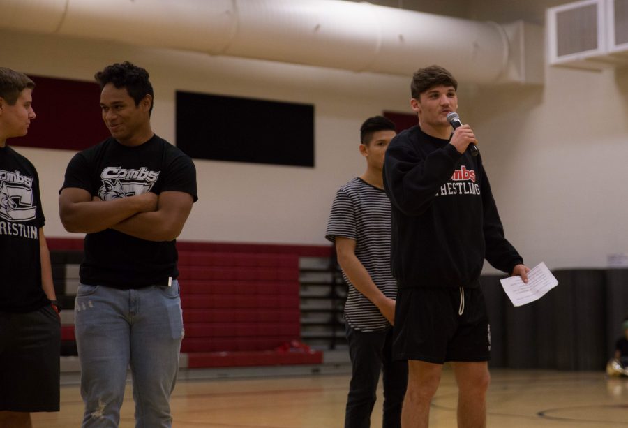 Senior Kyle Flake introduces himself and the scoring of himself and the varsity wrestling scores to entice the incoming freshman to join the growing wrestling program. 