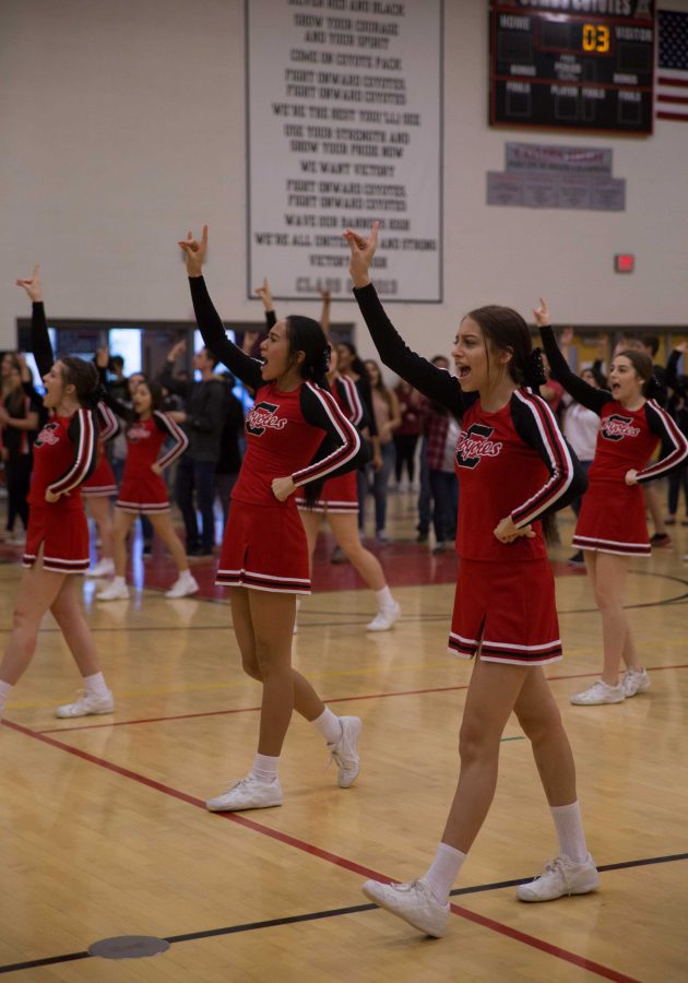 CHS varsity cheer ends the eighth grade assembly by leading the students in the fight song. 