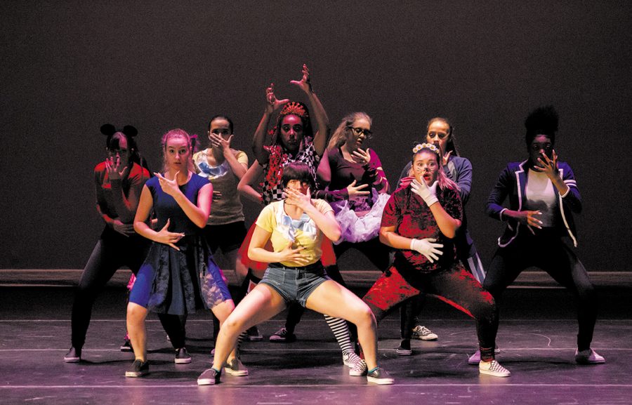 Rush Dance Company performs ‘Alice in Wonderland’ during first concert in the CPAC. Junior Shanece McCoy was the Queen of Hearts in the routine and appeared control the movements of the other dancers.