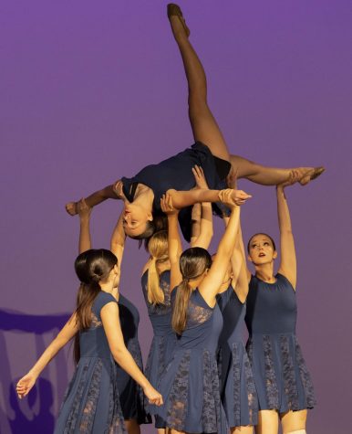 Junior Sophie Johnson was lifted in the air and slowly walked around during the first performance.