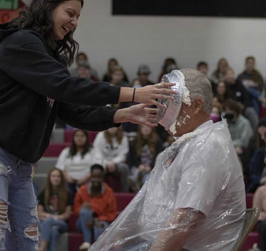 After the relay race, girls basketball came out for the win. Senior Aimee Hansen got to pie Assistant Principal Scott Sheldon in the face. 