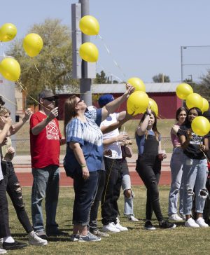 Chases mom and those that attended the balloon release let go of their ballooms.